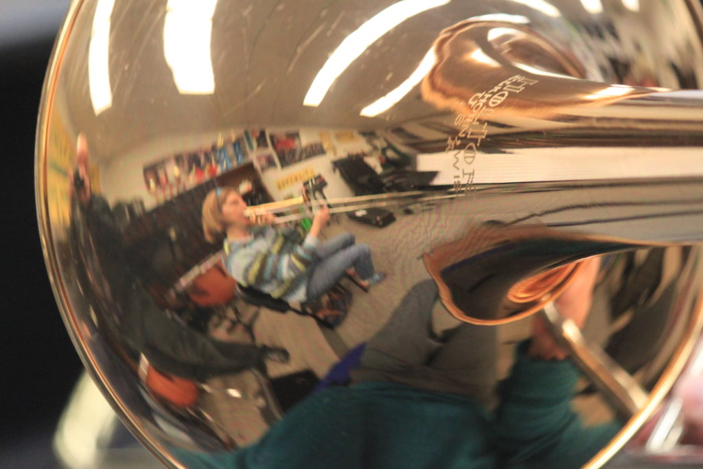 A close up of a brass instrument